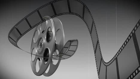 carrete de película contra un fondo en blanco y negro