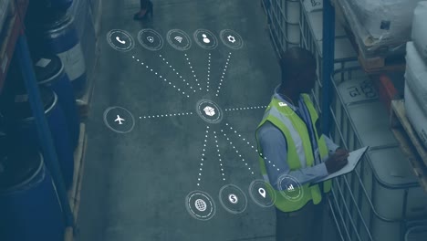 animación de procesamiento de datos con iconos sobre hombre afroamericano trabajando en un almacén