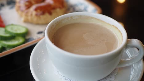 breakfast with coffee and pastry