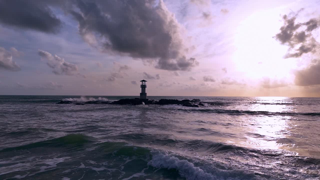 Lighthouse on a Rocky Outcrop at Sea