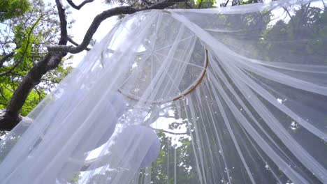 White-veil-decorations.-Delicate-transparent-decoration.-Transparent-fabric