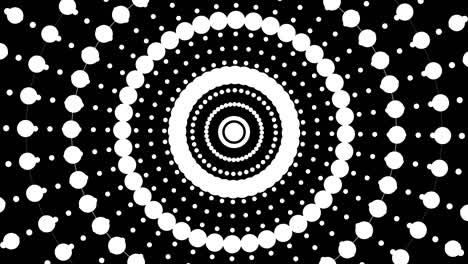 el patrón de puntos blancos es un arte de movimiento para la transición con el canal alfa.4k video. caleidoscopio de fondo. zoom en el patrón de círculos