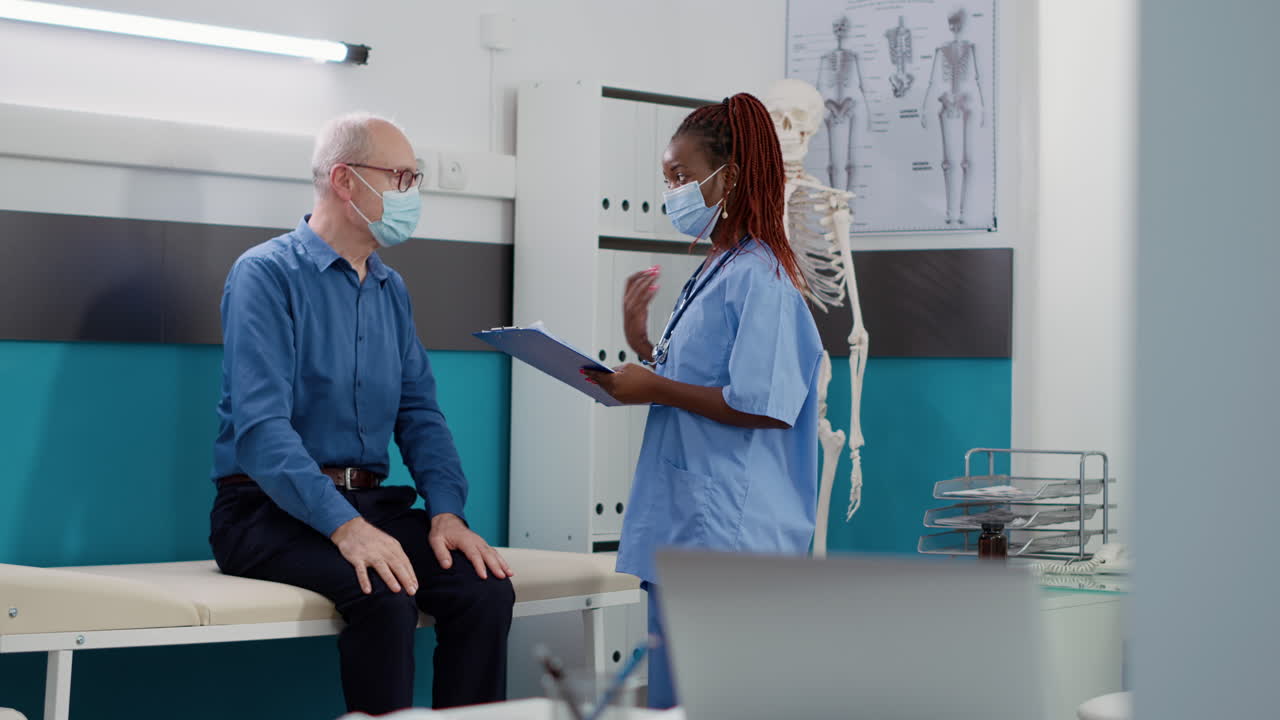 Doctor consulting with patient in clinic