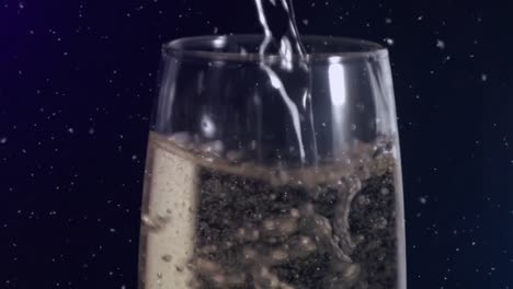 Animation-of-white-specks-floating-over-glass-of-champagne-on-black-background