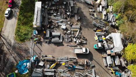 Unorganized-Piles-Of-Metallic-Scaffoldings-And-Formworks-In-An-Open-Warehouse