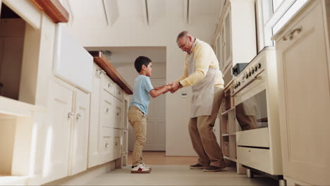 Dance,-kitchen-and-elderly-man-with-his-grandchild