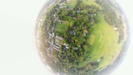 Aerial-asteroid-shot-overhead-a-residential-area-in-Sylhet,-Bangladesh