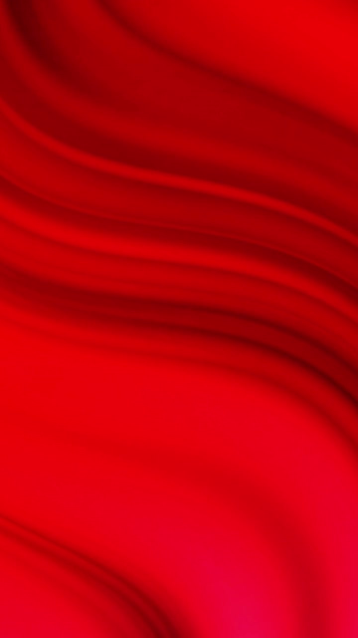 A vibrant red background with a soft, immersive color transition.