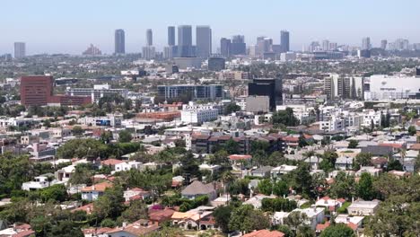 aerial view of west hollywood with century city buildings in misty skyline