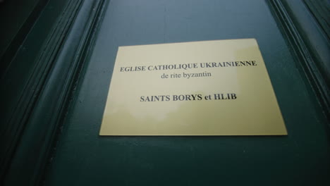 ukrainian catholic church in france close up of the front door with signs