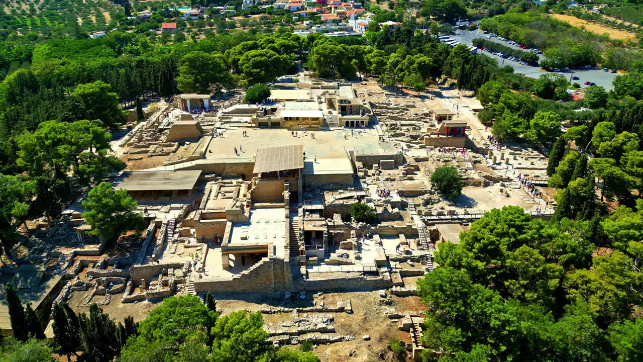 Circling aerial of the Palace of Knossos archaeological site in Greece, wide