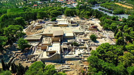 Circling aerial of the Palace of Knossos archaeological site in Greece, wide