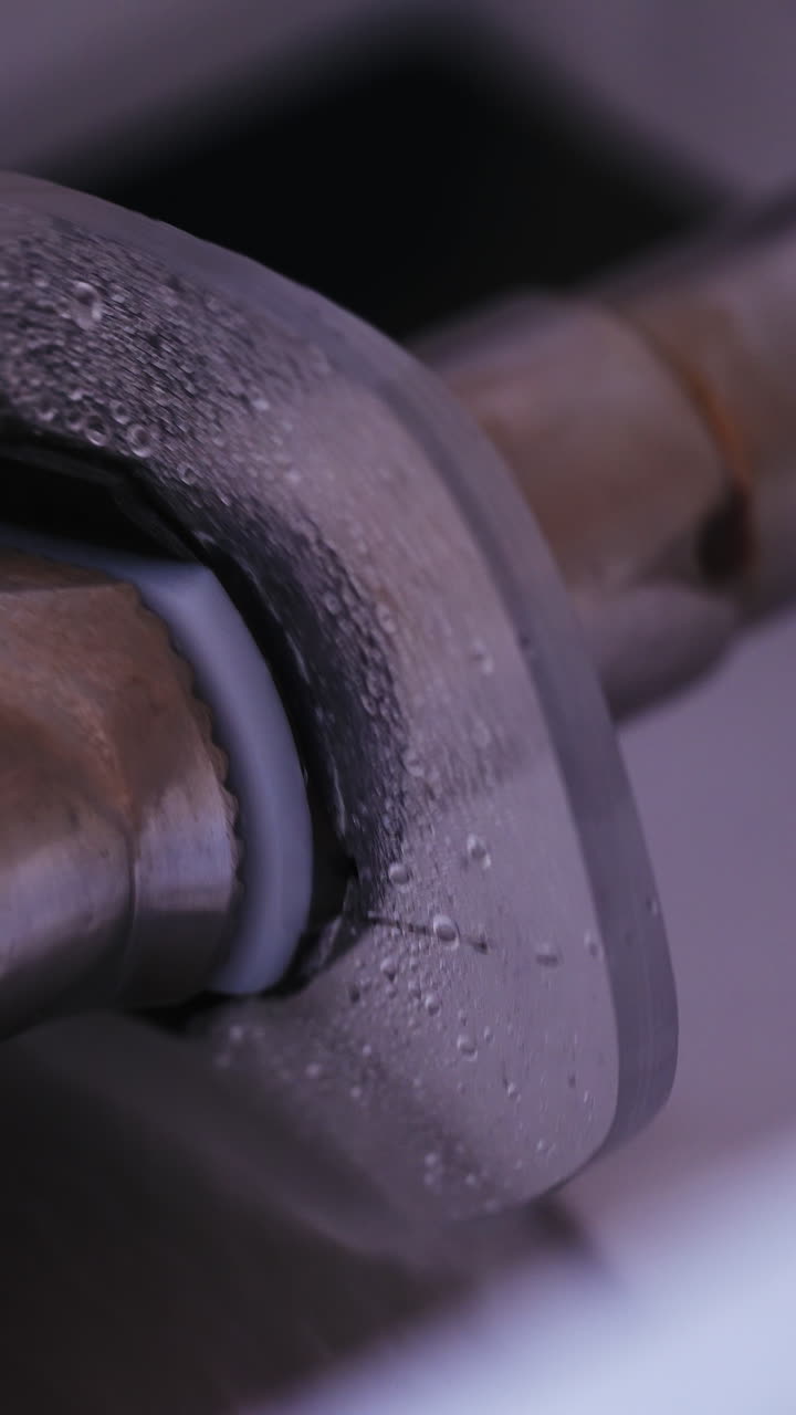 Workplace of ophthalmologist doctor. Machine for grinding and trimming lenses for glasses in optical store. Vertical video