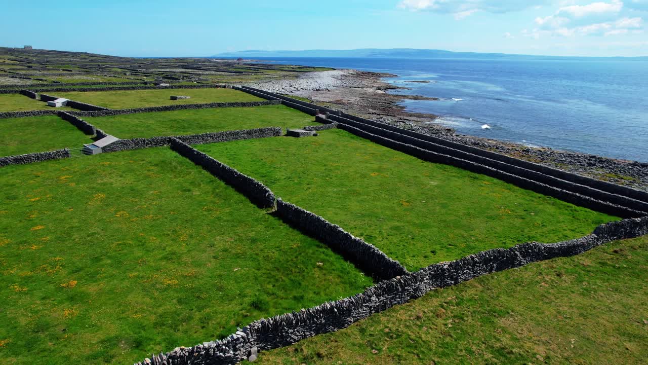 drone flying low over the rugged landscape of Inisheer Aran islands jewel of the Wild Atlantic Way Ireland