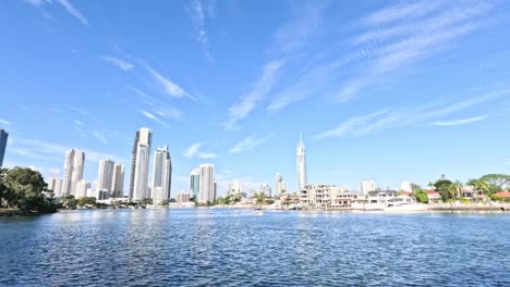 city skyline reflected on calm water