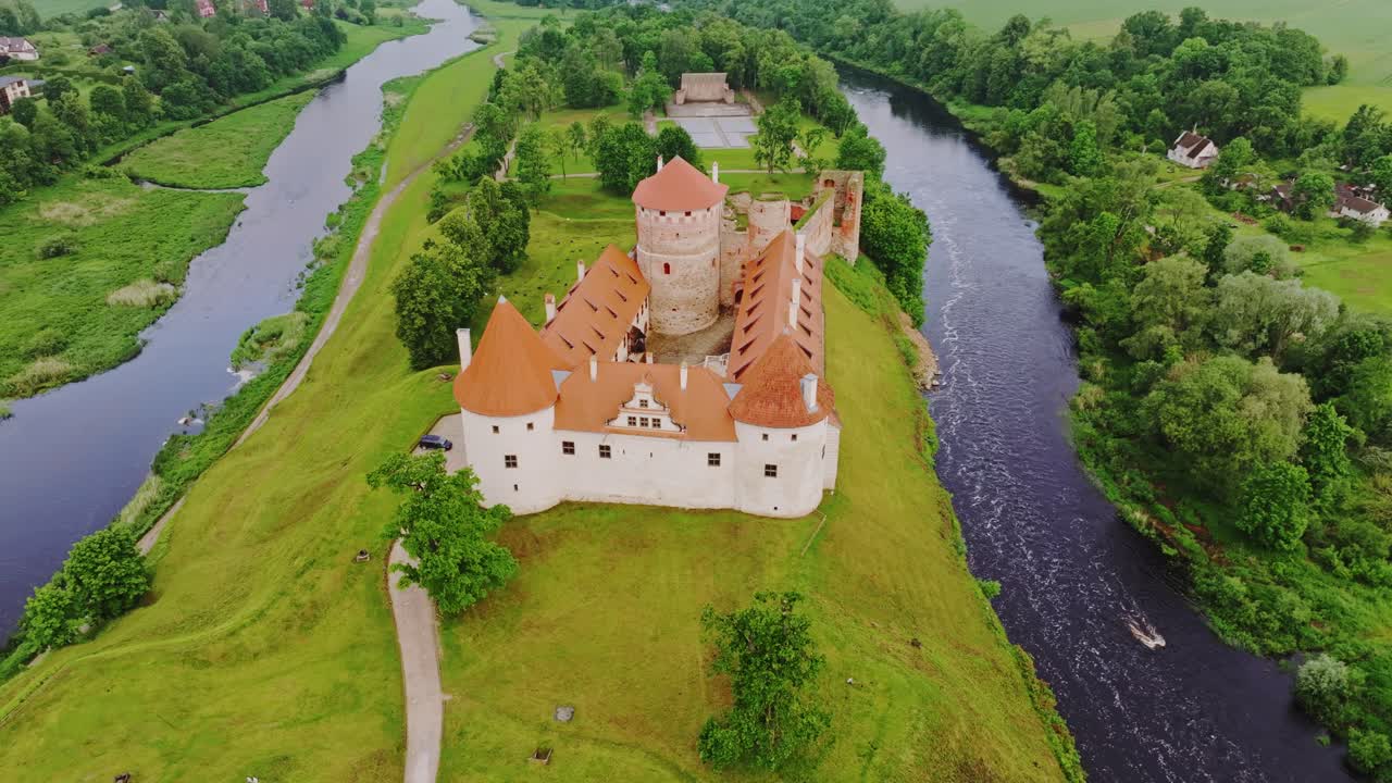 Aerial Cinematic Shot Of Bauska Castle Fortress Highlighting Baltic Travel Charm