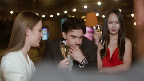 people playing poker at the casino.