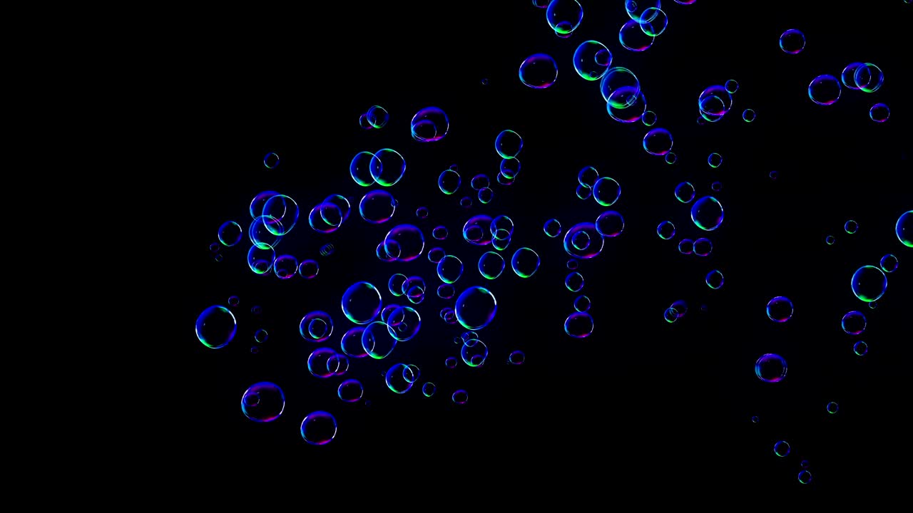 Rainbow bubbles on a dark background