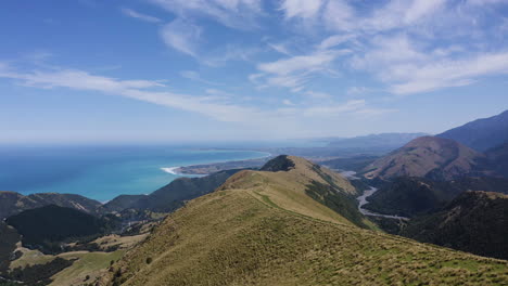 kiakoura hills and new zealand mountains aerial footage overlooking the beach