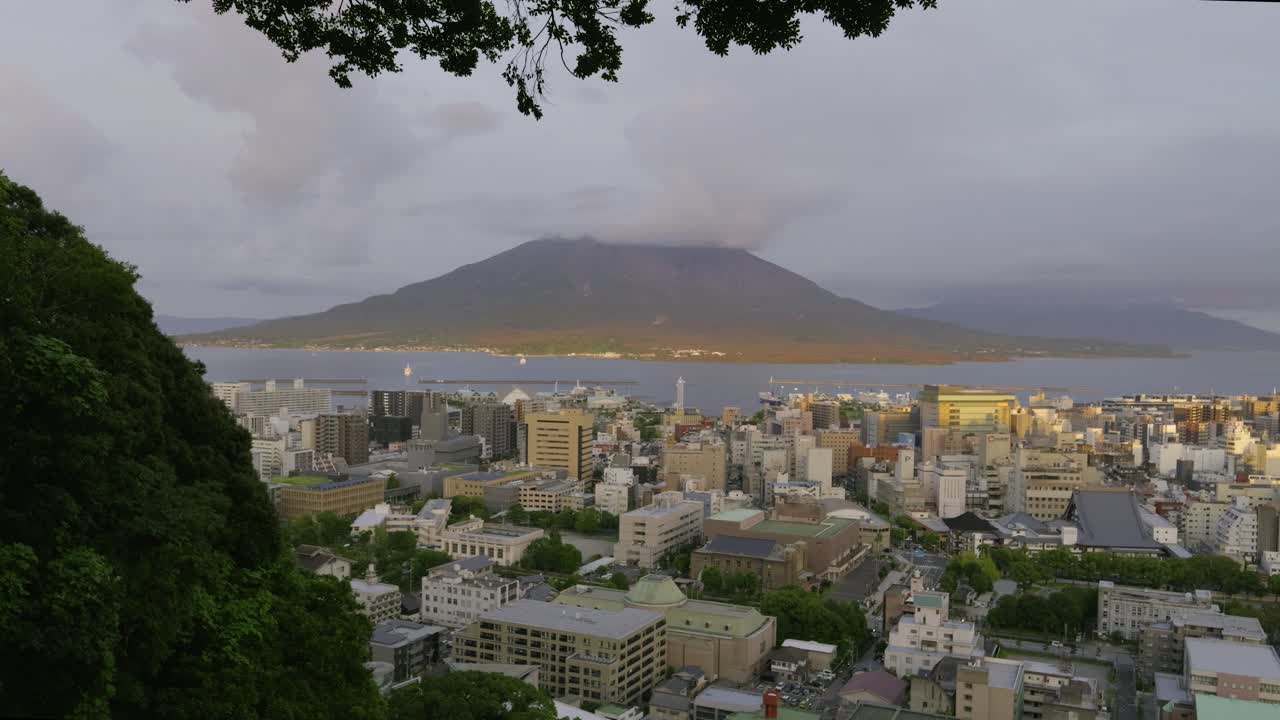 Perfect scenery over Kagoshima bay at sunset, locked off shot
