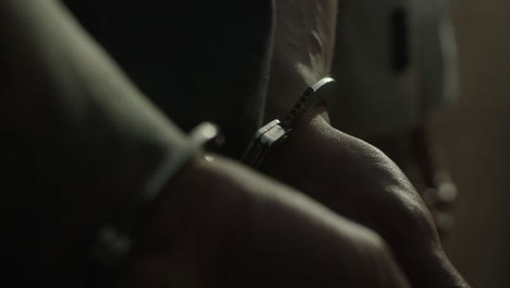 hands in handcuffs