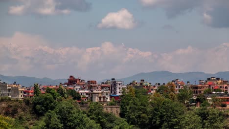 a time-lapse of clouds over the himalaya mountain range and the city of kathmandu, nepal.