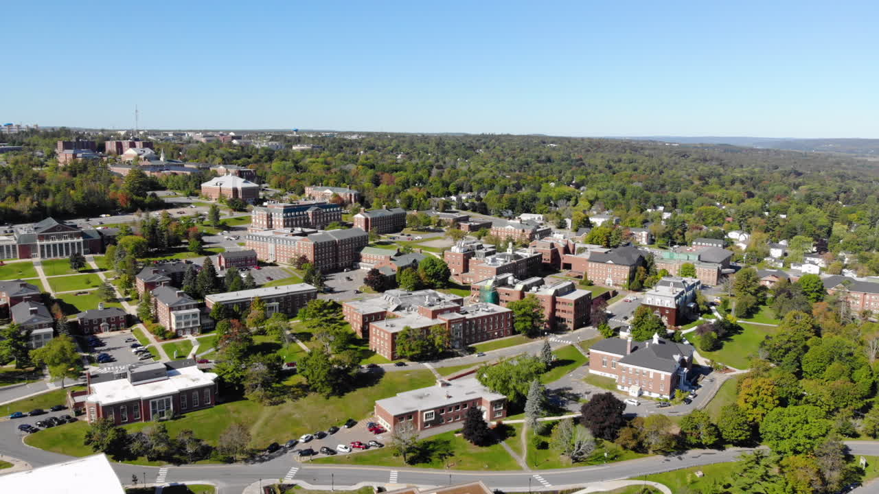 AERIAL: Rising While Moving Backwards To Show The University of New Brunswick In Fredericton
