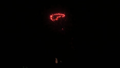 small firework, with a black sky behind