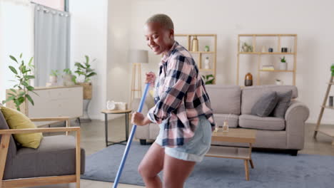 Singing,-dancing-or-black-woman-cleaning