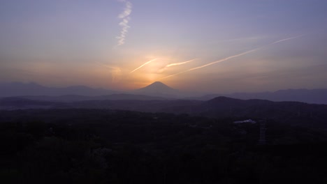 panoramic view out towards mount fuji silhouette at sunset with beautiful colors