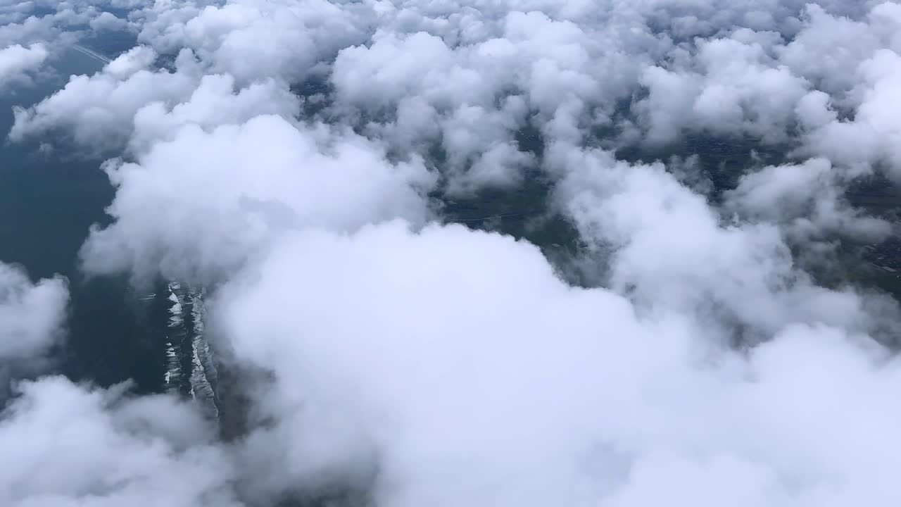 Aerial View of Farmland and Clouds