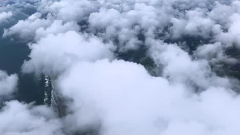 aerial view of farmland and clouds