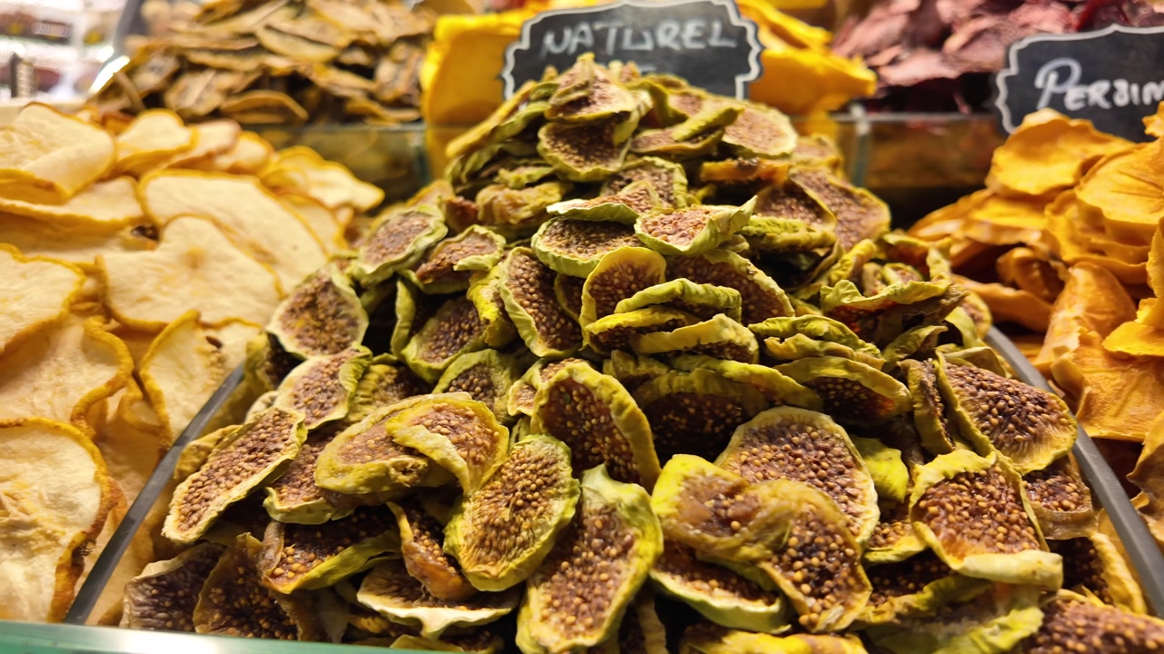 Close-up of Dried Figs and Other Fruits on Display at a Market