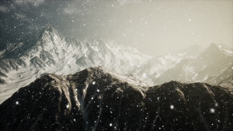 heavy snowing, focused on the snowflakes, mountains in the background