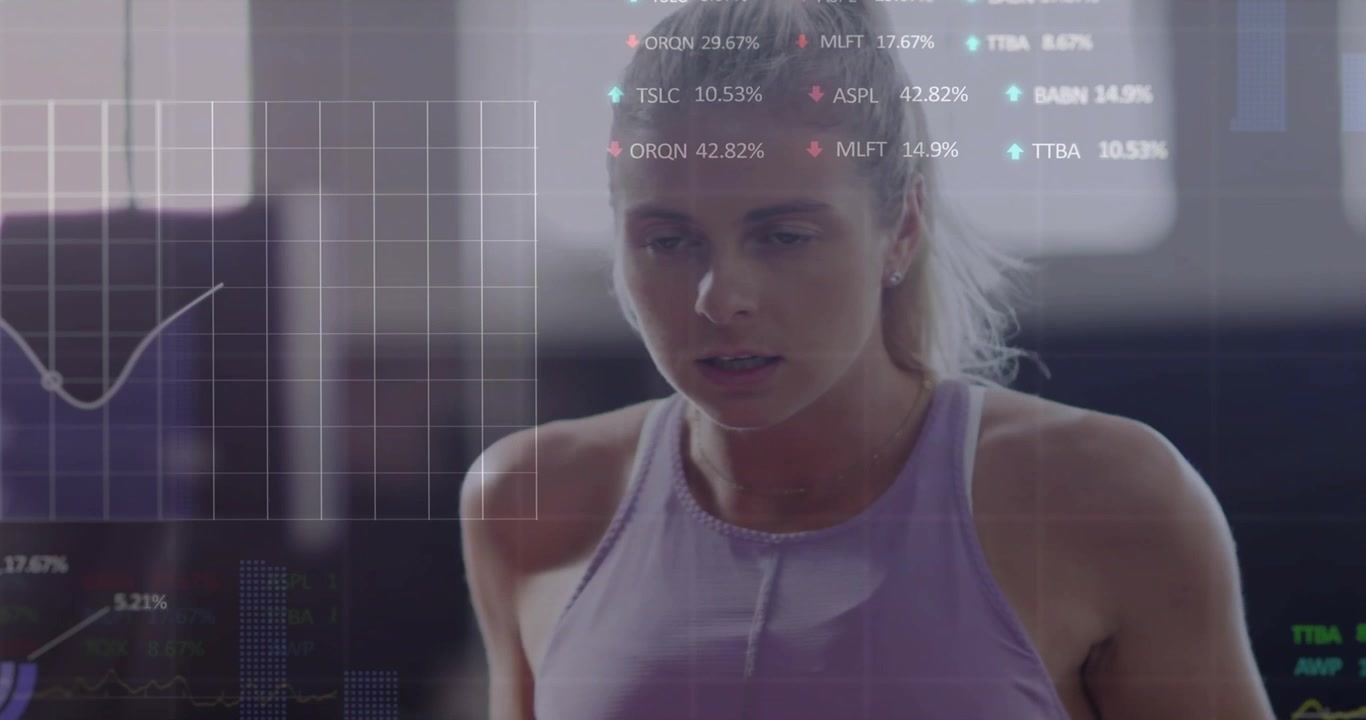 Rowing woman in purple tank top responding to metrics overlay, pulling handle on gym rowing machine