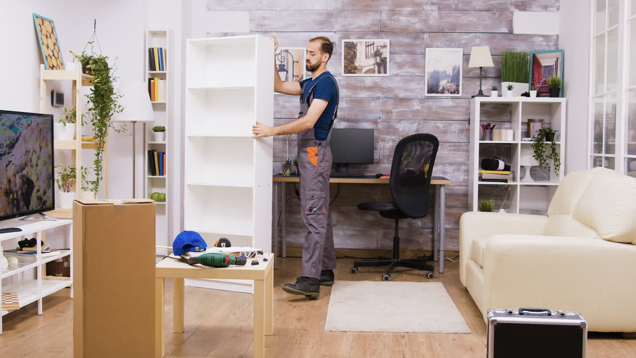 Man assembling furniture in a living room