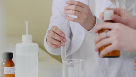 scientists conducting a chemical experiment in a lab