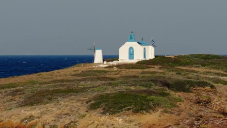 Picturesque-orthodox-church-on-small-island-in-Vravrona,-Greece