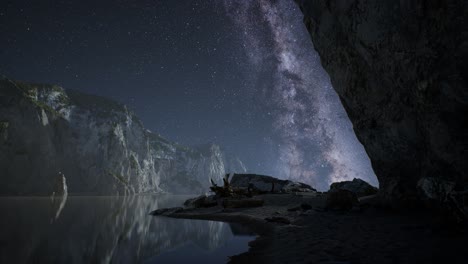 hyperlapse of night starry sky with mountain and ocean beach in lofoten norway