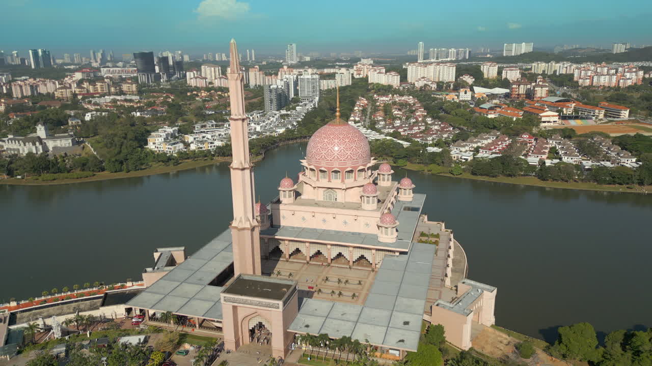 Impressive Pink Putra Mosque Architecture On The Water Kuala Lumpur Malaysia Drone Rotate 4K 60FPS