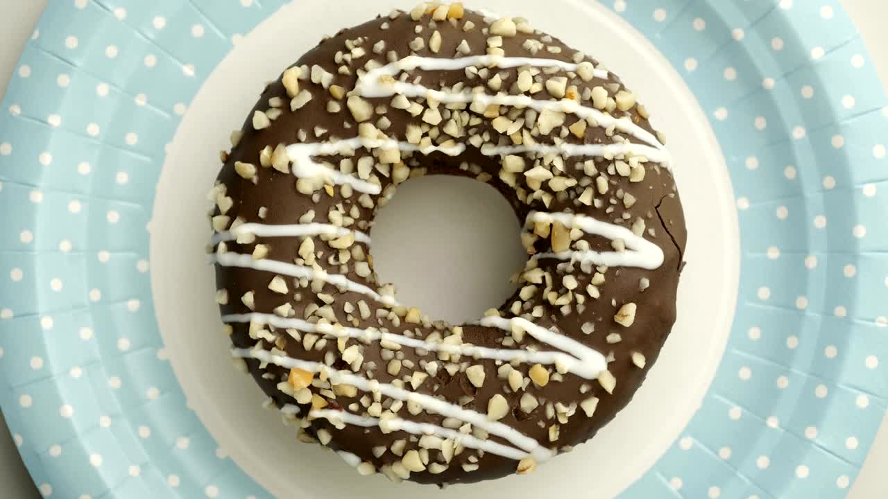el donut está vidriado de cerca, con un bucle sin costuras.