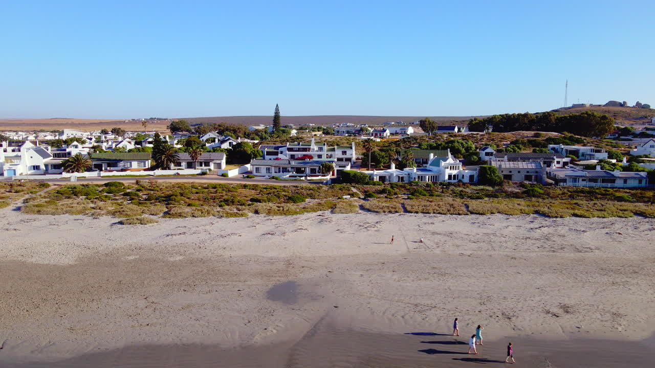 White-washed fishermen's cottages along beach of Paternoster, West Coast