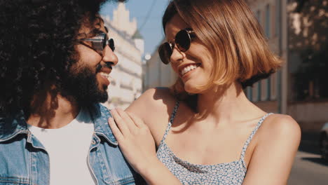 happy couple posing on the street