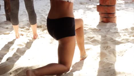 close up, woman legs moving exercising barefoot on the beach