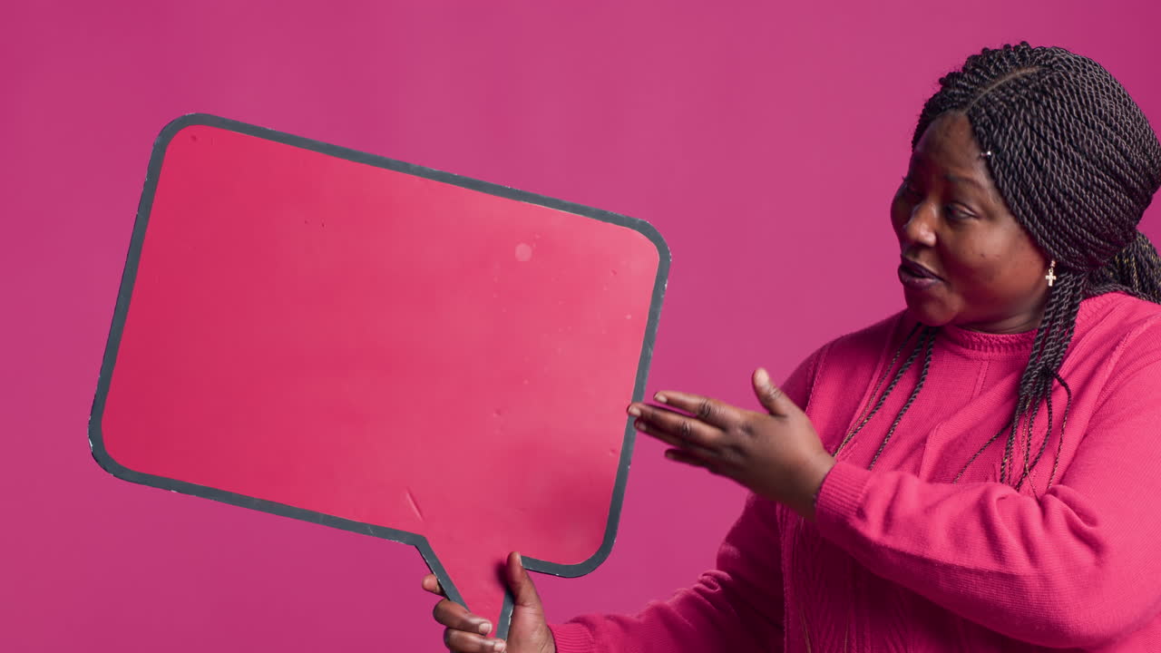 Lady Grasps Speech Bubble In Right-Hand