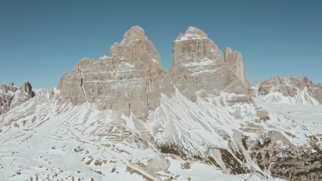 Circling-drone-shot-of-the-back-of-tre-cime-mountains-the-dolomites-italy