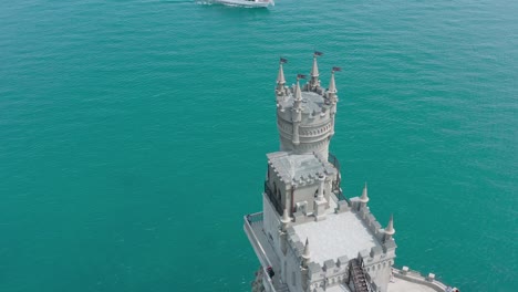 aerial view of a coastal castle on the sea