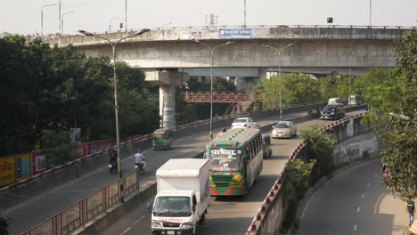 busy road with overpass in bangladesh