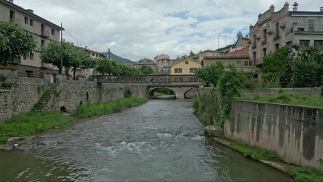 The-river-flowing-through-the-center-of-La-pobla-de-Lillet-in-Catalonia