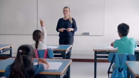 female teacher giving and explaining task